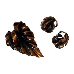 Vintage copper tone brooch and Avon clip on earrings